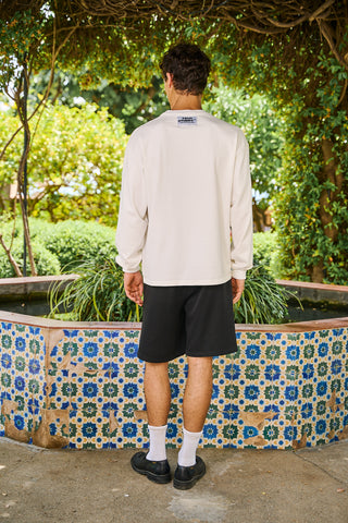Vista trasera de la camiseta Star Fish Longsleeve SALPI, diseño sencillo con corte recto y cuello redondo, estilo cómodo para el verano, colección Casa Salpi.